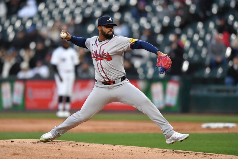 Apr 2, 2024; Chicago, Illinois, USA; Atlanta Braves starting pitcher Reynaldo Lopez (40) pitches during the first inning against the Chicago White Sox at Guaranteed Rate Field. Mandatory Credit: Patrick Gorski-USA TODAY Sports