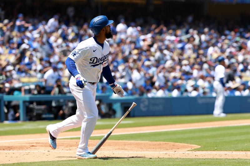 May 8, 2024; Los Angeles, California, USA;  Los Angeles Dodgers outfielder Teoscar Hernandez (37) hits a two-run home run during the sixth inning against the Miami Marlins at Dodger Stadium. Mandatory Credit: Kiyoshi Mio-USA TODAY Sports