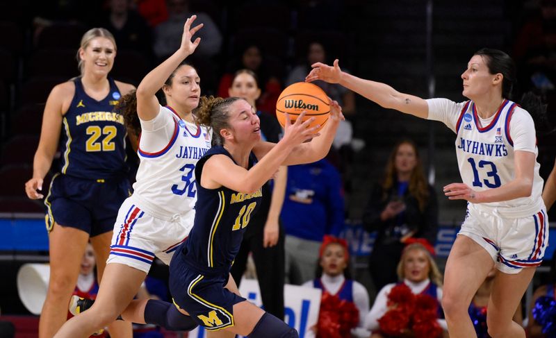 Mar 23, 2024; Los Angeles, CA, USA; Michigan Wolverines guard Jordan Hobbs (10) grabs as loose ball; between Kansas Jayhawks guard Skyler Gill (32) and Kansas Jayhawks guard Holly Kersgieter (13) during a  first round game of the Albany 2 Region at Galen Center. Mandatory Credit: Robert Hanashiro-USA TODAY Sports