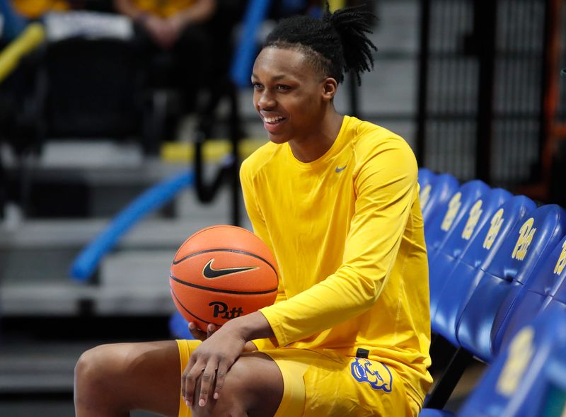 Jan 16, 2024; Pittsburgh, Pennsylvania, USA; Pittsburgh Panthers guard Carlton Carrington (7) looks on during warm ups before the game against the Syracuse Orange at the Petersen Events Center. Mandatory Credit: Charles LeClaire-USA TODAY Sports