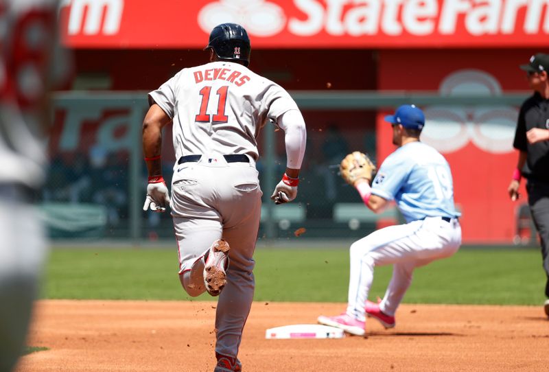May 11, 2025; Kansas City, Missouri, USA; Boston Red Sox third base Rafael Devers (11) gets forced out at second base at Kauffman Stadium. Mandatory Credit: Gary Rohman-Imagn Images