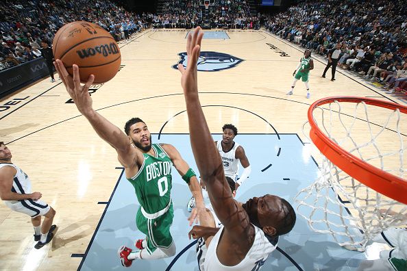 MEMPHIS, TN - NOVEMBER 19: Jayson Tatum #0 of the Boston Celtics drives to the basket during the game against the Memphis Grizzlies on November 19, 2023 at FedExForum in Memphis, Tennessee. NOTE TO USER: User expressly acknowledges and agrees that, by downloading and or using this photograph, User is consenting to the terms and conditions of the Getty Images License Agreement. Mandatory Copyright Notice: Copyright 2023 NBAE (Photo by Joe Murphy/NBAE via Getty Images)