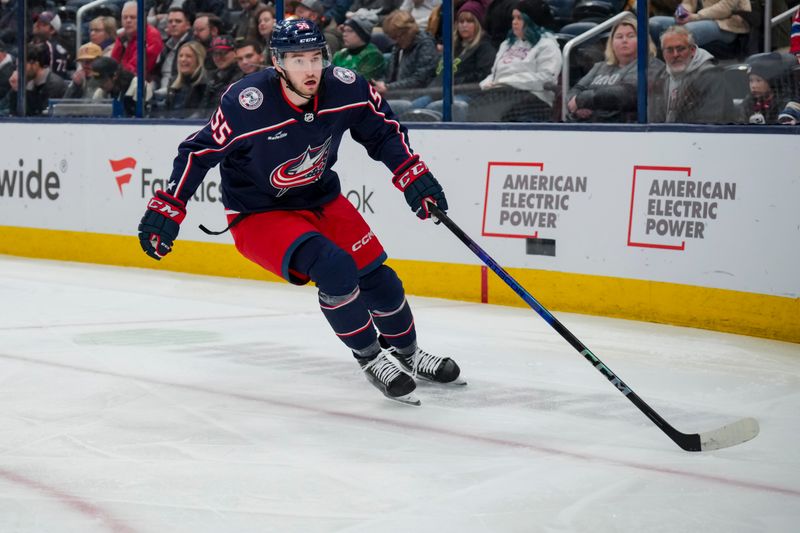 Nov 29, 2023; Columbus, Ohio, USA;  Columbus Blue Jackets defenseman David Jiricek (55) skates after the puck in the game against the Montreal Canadiens in the first period at Nationwide Arena. Mandatory Credit: Aaron Doster-USA TODAY Sports