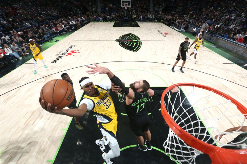 NEW ORLEANS, LA - MARCH 1:  Myles Turner #33 of the Indiana Pacers drives to the basket during the game as Jonas Valanciunas #17 of the New Orleans Pelicans plays defense on March 1, 2024 at the Smoothie King Center in New Orleans, Louisiana. NOTE TO USER: User expressly acknowledges and agrees that, by downloading and or using this Photograph, user is consenting to the terms and conditions of the Getty Images License Agreement. Mandatory Copyright Notice: Copyright 2024 NBAE (Photo by Layne Murdoch Jr./NBAE via Getty Images)