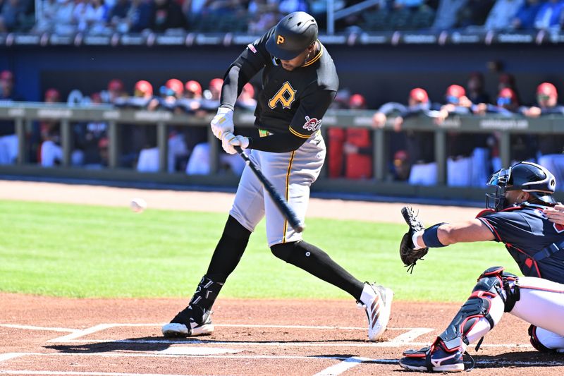 Feb 25, 2026; North Port, Florida, USA; Pittsburgh Pirates center fielder Oneil Cruz (15) hits a single in the first inning against the Atlanta Braves during spring training at CoolToday Park. Mandatory Credit: Jonathan Dyer-Imagn Images