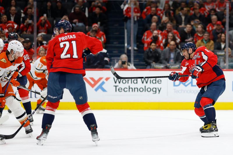 Jan 14, 2025; Washington, District of Columbia, USA; Washington Capitals left wing Alex Ovechkin (8) shoots the puck against the Anaheim Ducks in the first period at Capital One Arena. Mandatory Credit: Geoff Burke-Imagn Images