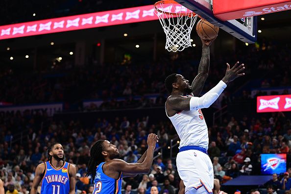 OKLAHOMA CITY, OKLAHOMA - DECEMBER 27: Julius Randle #30 of the New York Knicks goes up for a layup during the second half against the Oklahoma City Thunder at Paycom Center on December 27, 2023 in Oklahoma City, Oklahoma. NOTE TO USER: User expressly acknowledges and agrees that, by downloading and or using this Photograph, user is consenting to the terms and conditions of the Getty Images License Agreement. (Photo by Joshua Gateley/Getty Images)