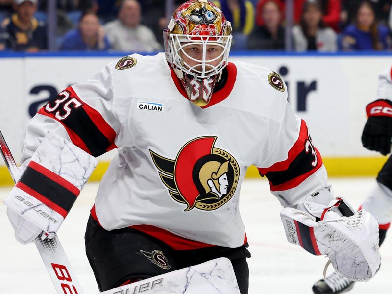 Nov 5, 2024; Buffalo, New York, USA;  Ottawa Senators goaltender Linus Ullmark (35) looks for the puck during the second period against the Buffalo Sabres at KeyBank Center. Mandatory Credit: Timothy T. Ludwig-Imagn Images