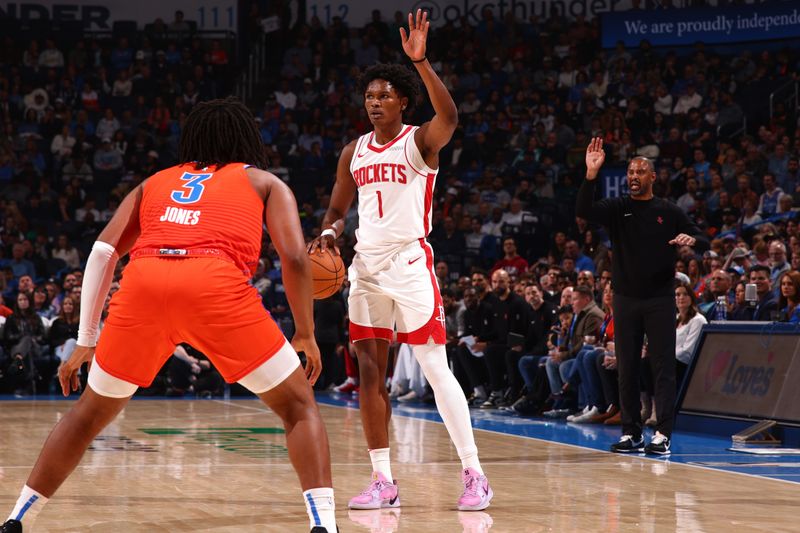 OKLAHOMA CITY, OK - NOVEMBER 8: Amen Thompson #1 of the Houston Rockets handles the ball during the game against the Oklahoma City Thunder on November 8, 2024 at Paycom Center in Oklahoma City, Oklahoma. NOTE TO USER: User expressly acknowledges and agrees that, by downloading and or using this photograph, User is consenting to the terms and conditions of the Getty Images License Agreement. Mandatory Copyright Notice: Copyright 2024 NBAE (Photo by Zach Beeker/NBAE via Getty Images)