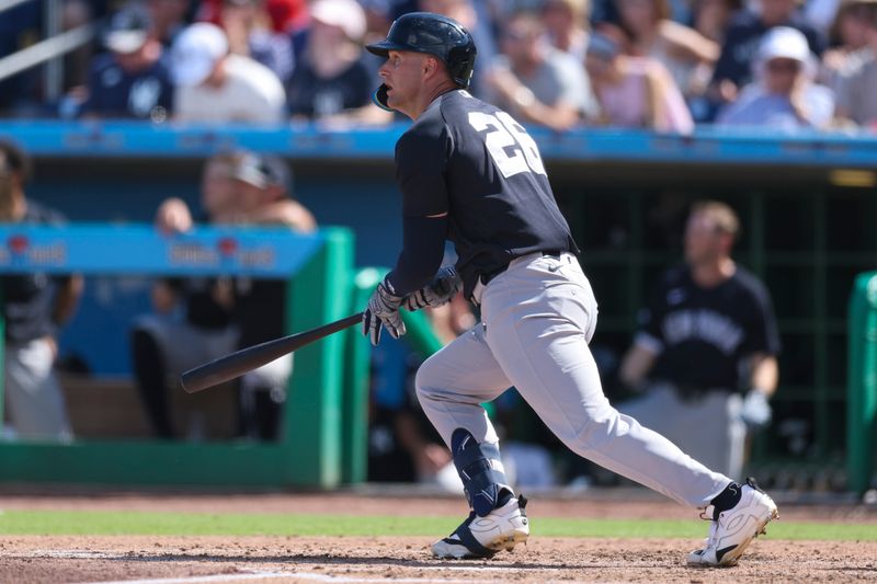 Mar 1, 2026; Clearwater, Florida, USA; New York Yankees right fielder Seth Brown (26) hits an rbi single against the New York Yankees in the fifth inning during spring training at BayCare Ballpark. Mandatory Credit: Nathan Ray Seebeck-Imagn Images