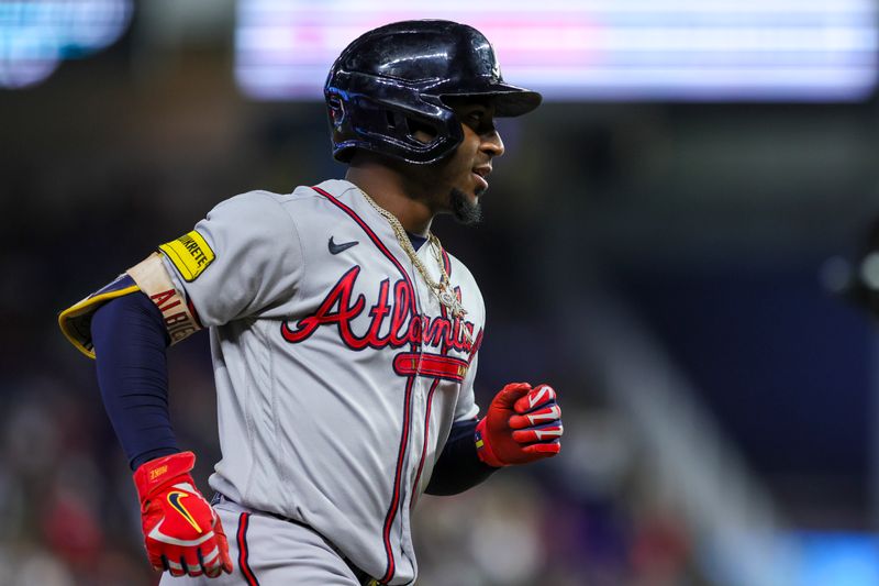 Sep 16, 2023; Miami, Florida, USA; Atlanta Braves second baseman Ozzie Albies (1) circles the bases after hitting a two-run home run against the Miami Marlins during the first inning at loanDepot Park. Mandatory Credit: Sam Navarro-USA TODAY Sports