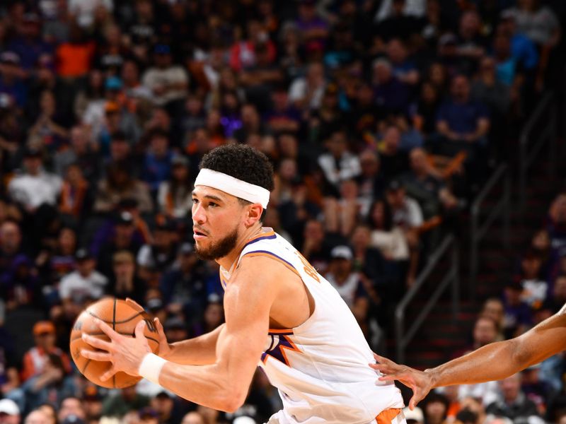 PHOENIX, AZ - MARCH 20: Devin Booker #1 of the Phoenix Suns handles the ball during the game against the Philadelphia 76ers on March 20, 2024 at Footprint Center in Phoenix, Arizona. NOTE TO USER: User expressly acknowledges and agrees that, by downloading and or using this photograph, user is consenting to the terms and conditions of the Getty Images License Agreement. Mandatory Copyright Notice: Copyright 2024 NBAE (Photo by Barry Gossage/NBAE via Getty Images)