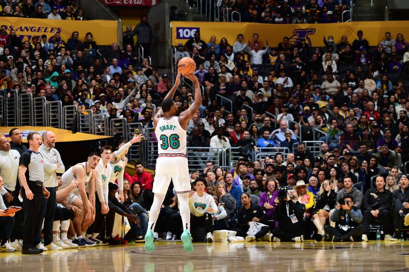 LOS ANGELES, CA - NOVEMBER 13: Marcus Smart #36 of the Memphis Grizzlies shoots a three point basket during the game against the Los Angeles Lakers on November 13, 2024 at Crypto.Com Arena in Los Angeles, California. NOTE TO USER: User expressly acknowledges and agrees that, by downloading and/or using this Photograph, user is consenting to the terms and conditions of the Getty Images License Agreement. Mandatory Copyright Notice: Copyright 2024 NBAE (Photo by Adam Pantozzi/NBAE via Getty Images)