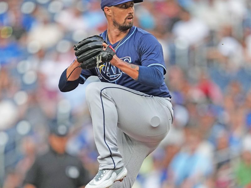 Jul 23, 2024; Toronto, Ontario, CAN; Tampa Bay Rays starting pitcher Shawn Armstrong (64) throws a pitch Toronto Blue Jays during the first inning at Rogers Centre. Mandatory Credit: Nick Turchiaro-USA TODAY Sports