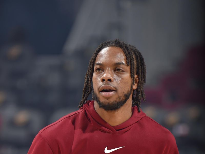 CLEVELAND, OH - NOVEMBER 23: Darius Garland #10 of the Cleveland Cavaliers warms up prior to the game against the Portland Trail Blazers on November 23, 2022 at Rocket Mortgage FieldHouse in Cleveland, Ohio. NOTE TO USER: User expressly acknowledges and agrees that, by downloading and/or using this Photograph, user is consenting to the terms and conditions of the Getty Images License Agreement. Mandatory Copyright Notice: Copyright 2022 NBAE (Photo by David Liam Kyle/NBAE via Getty Images)