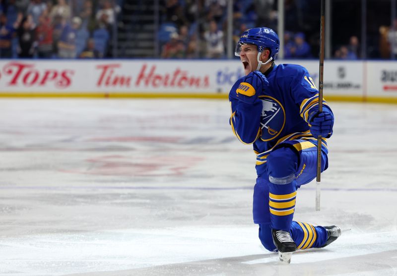 Oct 12, 2024; Buffalo, New York, USA;  Buffalo Sabres defenseman Henri Jokiharju (10) reacts after scoring a goal during the second period against the Florida Panthers at KeyBank Center. Mandatory Credit: Timothy T. Ludwig-Imagn Images