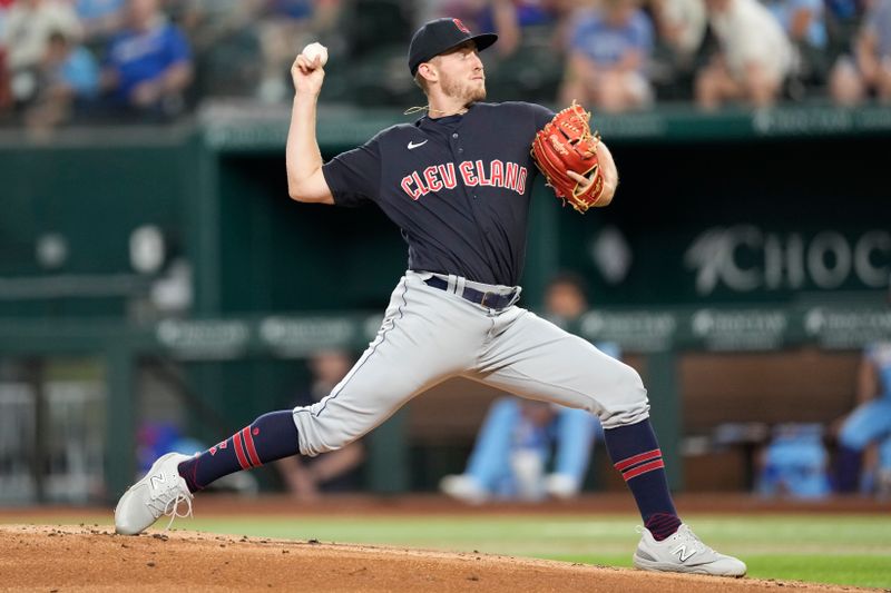 Jul 16, 2023; Arlington, Texas, USA; Cleveland Guardians starting pitcher Tanner Bibee (61) delivers a pitch to the Texas Rangers during the first inning at Globe Life Field. Mandatory Credit: Jim Cowsert-USA TODAY Sports