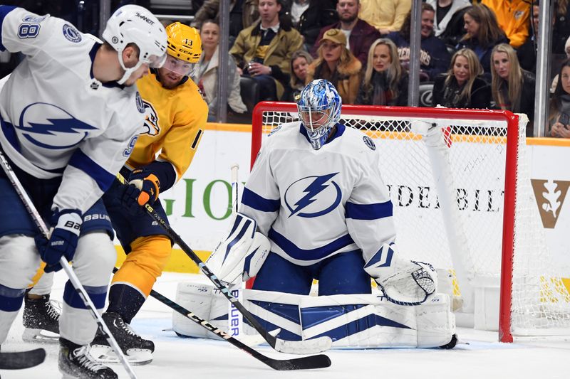 Dec 7, 2023; Nashville, Tennessee, USA; Tampa Bay Lightning goaltender Jonas Johansson (31) makes a save during the third period against the Nashville Predators at Bridgestone Arena. Mandatory Credit: Christopher Hanewinckel-USA TODAY Sports