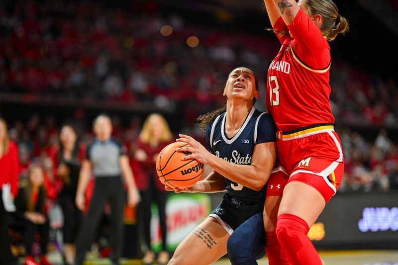 Feb 18, 2024; College Park, Maryland, USA;  Penn State Nittany Lions guard Leilani Kapinus (5) looks to shoot as Maryland Terrapins guard Faith Masonius (13) defends during the first half at Xfinity Center. Mandatory Credit: Tommy Gilligan-USA TODAY Sports