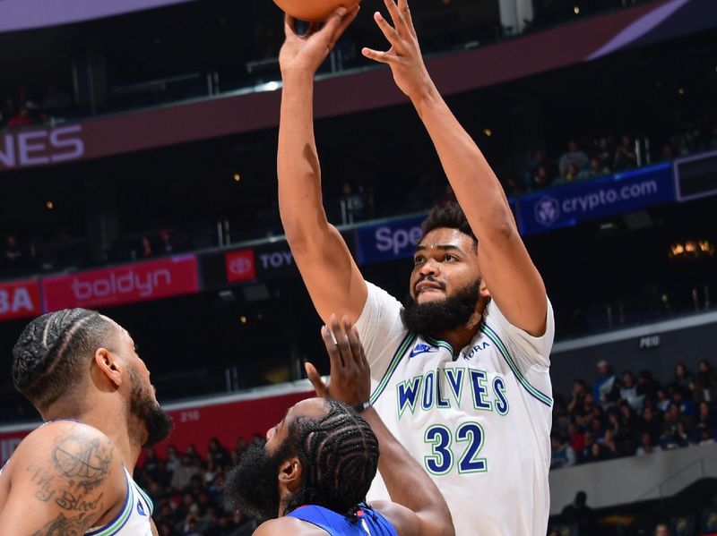 LOS ANGELES, CA - FEBRUARY 12:  Karl-Anthony Towns #32 of the Minnesota Timberwolves shoots the ball during the game  on February 12, 2024 at Crypto.Com Arena in Los Angeles, California. NOTE TO USER: User expressly acknowledges and agrees that, by downloading and/or using this Photograph, user is consenting to the terms and conditions of the Getty Images License Agreement. Mandatory Copyright Notice: Copyright 2024 NBAE (Photo by Adam Pantozzi/NBAE via Getty Images)