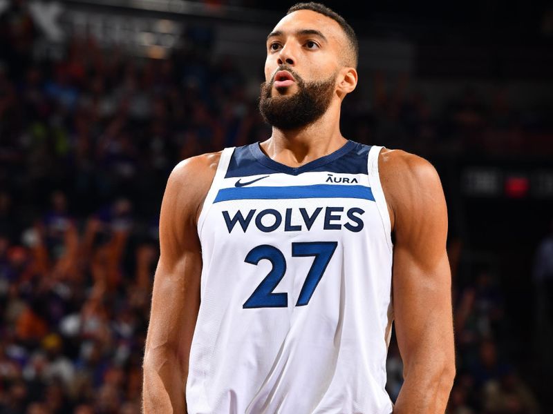 PHOENIX, AZ - APRIL 4: Rudy Gobert #27 of the Minnesota Timberwolves prepares to shoot a free throw during the game against the Phoenix Suns during Round 1 Game 4 of the 2024 NBA Playoffs on April 4, 2023 at Footprint Center in Phoenix, Arizona. NOTE TO USER: User expressly acknowledges and agrees that, by downloading and or using this photograph, user is consenting to the terms and conditions of the Getty Images License Agreement. Mandatory Copyright Notice: Copyright 2024 NBAE (Photo by Barry Gossage/NBAE via Getty Images)