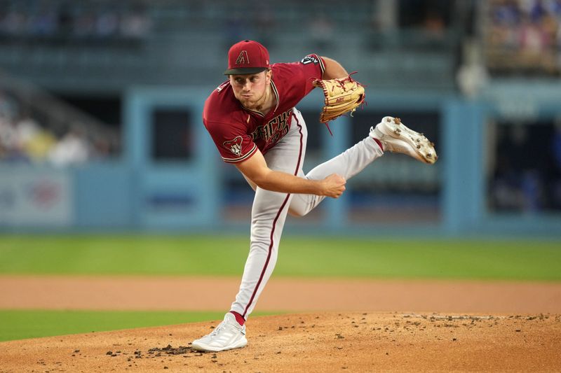 Aug 29, 2023; Los Angeles, California, USA; Arizona Diamondbacks starting pitcher Brandon Pfaadt (32) throws in the first inning against the Los Angeles Dodgers at Dodger Stadium. Mandatory Credit: Kirby Lee-USA TODAY Sports