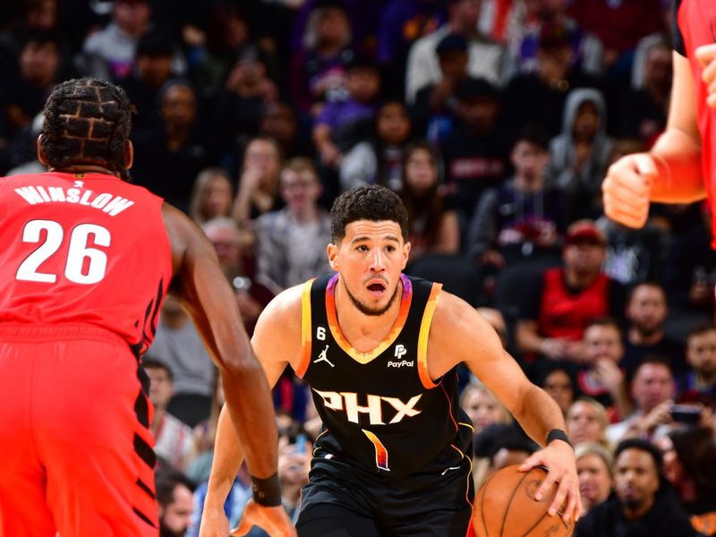 PHOENIX, AZ - NOVEMBER 4: Devin Booker #1 of the Phoenix Suns dribbles the ball during the game against the Portland Trail Blazers on November 4, 2022 at Footprint Center in Phoenix, Arizona. NOTE TO USER: User expressly acknowledges and agrees that, by downloading and or using this photograph, user is consenting to the terms and conditions of the Getty Images License Agreement. Mandatory Copyright Notice: Copyright 2022 NBAE (Photo by Barry Gossage/NBAE via Getty Images)