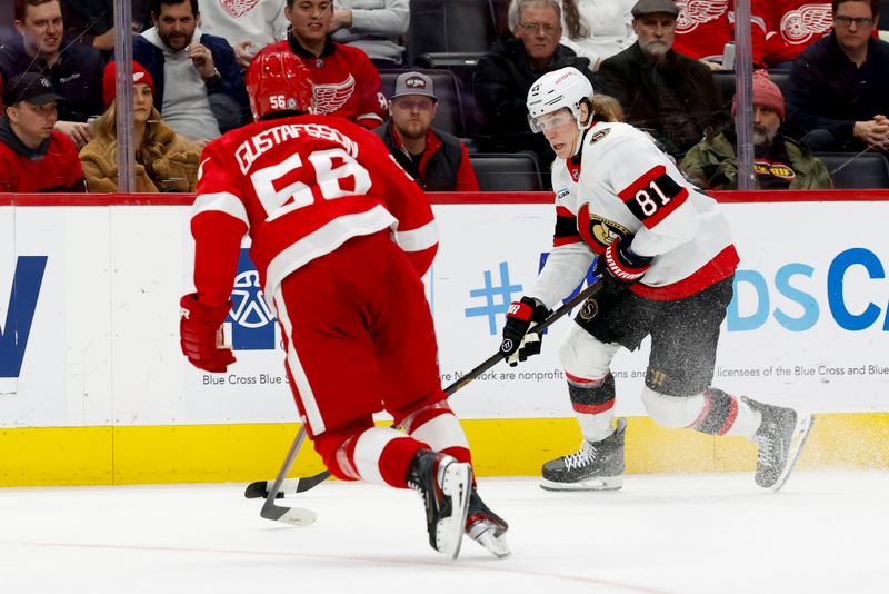 Jan 7, 2025; Detroit, Michigan, USA; Ottawa Senators right wing Adam Gaudette (81) skates with the puck defended by Detroit Red Wings defenseman Erik Gustafsson (56) in the third period at Little Caesars Arena. Mandatory Credit: Rick Osentoski-Imagn Images