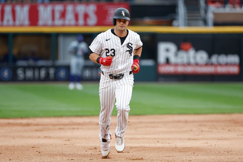 Jun 25, 2024; Chicago, Illinois, USA; Chicago White Sox outfielder Andrew Benintendi (23) rounds the bases after hitting a two-run home run against the Los Angeles Dodgers during the first inning at Guaranteed Rate Field. Mandatory Credit: Kamil Krzaczynski-USA TODAY Sports