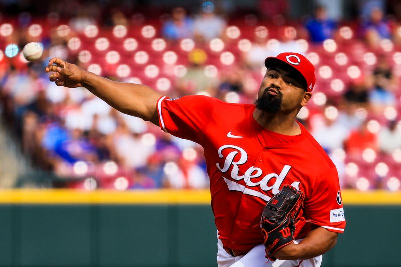 Sep 21, 2025; Cincinnati, Ohio, USA; Cincinnati Reds relief pitcher Tony Santillan (64) pitches against the Chicago Cubs in the ninth inning at Great American Ball Park. Mandatory Credit: Katie Stratman-Imagn Images