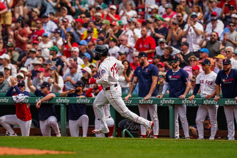 Jun 4, 2025; Boston, Massachusetts, USA; Boston Red Sox catcher Carlos Narváez (75) hits a single to drive in a run against the Los Angeles Angels in the fourth inning at Fenway Park. Mandatory Credit: David Butler II-Imagn Images