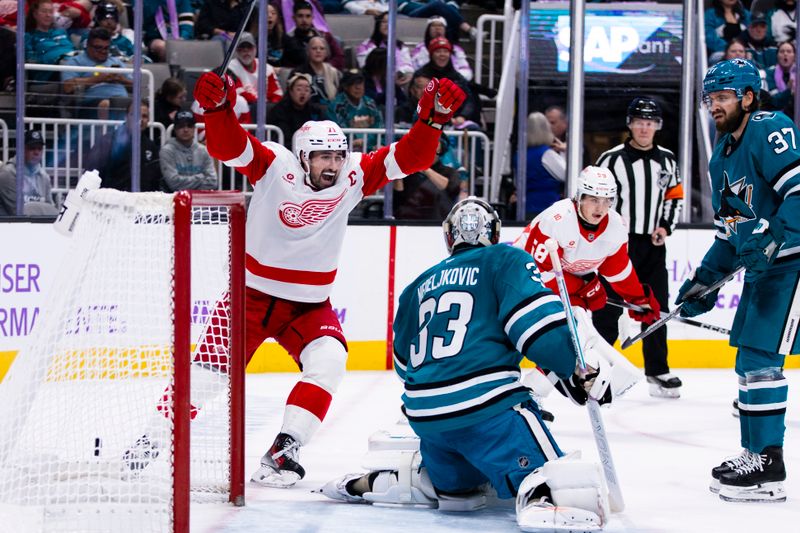 Nov 2, 2025; San Jose, California, USA;  Detroit Red Wings center Dylan Larkin (71) reacts after left wing Lucas Raymond (23) scored a goal against the San Jose Sharks during the second period at SAP Center at San Jose. Mandatory Credit: John Hefti-Imagn Images