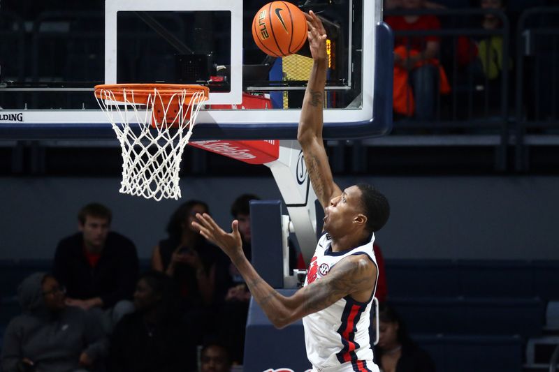 Dec 5, 2023; Oxford, Mississippi, USA; Mississippi Rebels forward Jamarion Sharp (3) dunks during the second half against the Mount St. Mary's Mountaineers at The Sandy and John Black Pavilion at Ole Miss. Mandatory Credit: Petre Thomas-USA TODAY Sports