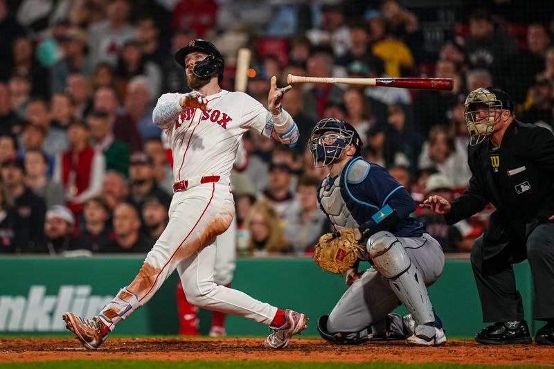 Jun 10, 2025; Boston, Massachusetts, USA; Boston Red Sox shortstop Trevor Story (10) hits a home run against the Tampa Bay Rays in the sixth inning at Fenway Park. Mandatory Credit: David Butler II-Imagn Images