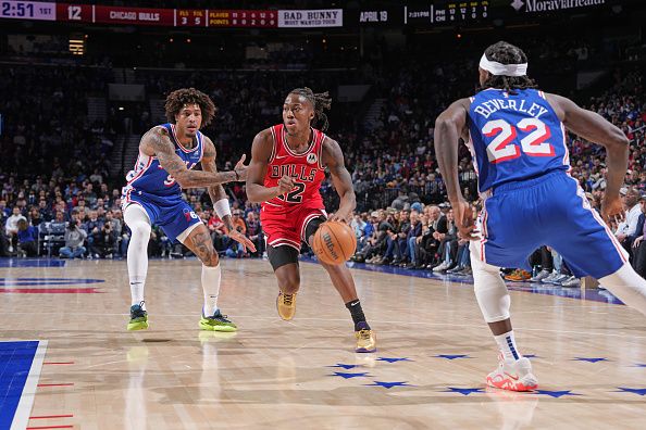 PHILADELPHIA, PA - JANUARY 2: Ayo Dosunmu #12 of the Chicago Bulls dribbles the ball during the game against the Philadelphia 76ers on January 2, 2024 at the Wells Fargo Center in Philadelphia, Pennsylvania NOTE TO USER: User expressly acknowledges and agrees that, by downloading and/or using this Photograph, user is consenting to the terms and conditions of the Getty Images License Agreement. Mandatory Copyright Notice: Copyright 2023 NBAE (Photo by Jesse D. Garrabrant/NBAE via Getty Images)