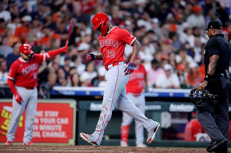 Apr 13, 2025; Houston, Texas, USA; Los Angeles Angels right fielder Jorge Soler (12) crosses home plate after hitting a home run to left field against the Houston Astros during the sixth inning at Daikin Park. Mandatory Credit: Erik Williams-Imagn Images