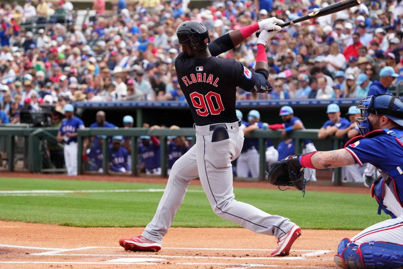 Mar 12, 2024; Surprise, Arizona, USA; Cleveland Guardians right fielder Estevan Florial (90) bats against the Texas Rangers during the first inning at Surprise Stadium. Mandatory Credit: Joe Camporeale-USA TODAY Sports