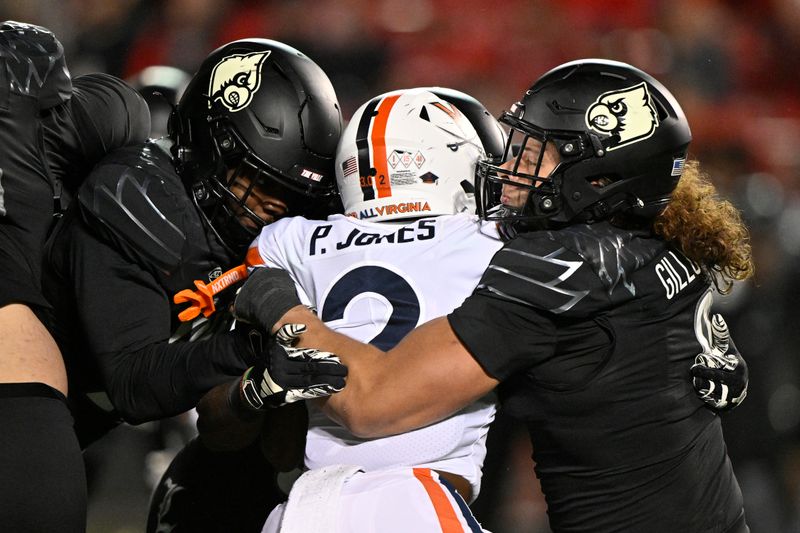 Nov 9, 2023; Louisville, Kentucky, USA; Louisville Cardinals defensive lineman Ashton Gillotte (9) tackles Virginia Cavaliers running back Perris Jones (2) during the second half at L&N Federal Credit Union Stadium. Louisville defeated Virginia 31-24. Mandatory Credit: Jamie Rhodes-USA TODAY Sports