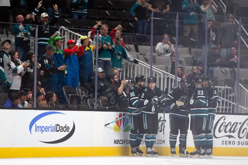 Oct 31, 2024; San Jose, California, USA; San Jose Sharks center Will Smith (2) celebrates his first NHL goal during the first period against the Chicago Blackhawks at SAP Center at San Jose. Mandatory Credit: D. Ross Cameron-Imagn Images