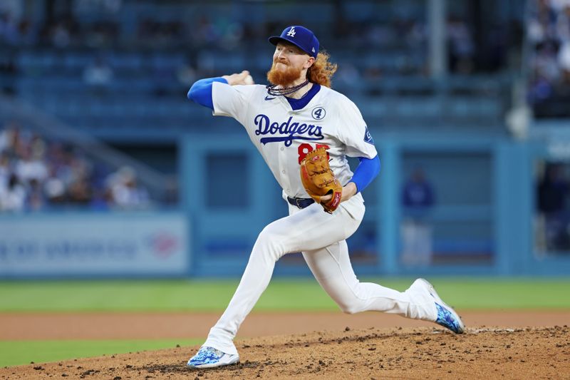 Jun 2, 2025; Los Angeles, California, USA; Los Angeles Dodgers pitcher Dustin May (85) makes a pitch during the second inning against the New York Mets during the third inning against the New York Mets at Dodger Stadium. Mandatory Credit: Jason Parkhurst-Imagn Images