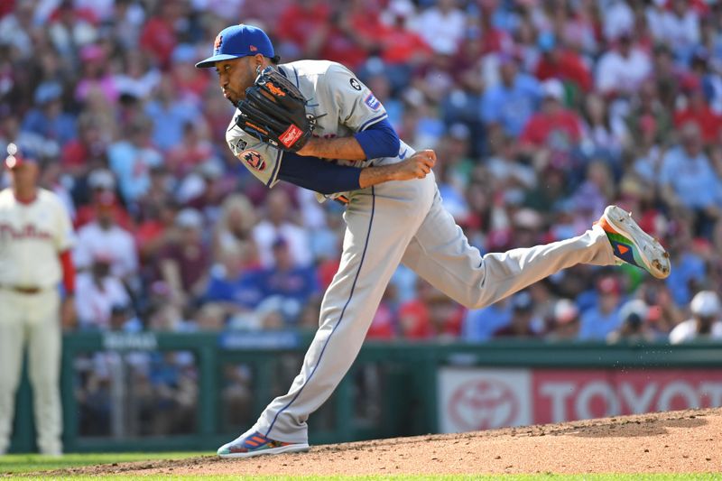 Sep 15, 2024; Philadelphia, Pennsylvania, USA; New York Mets relief pitcher Edwin Diaz (21) throws a pitch during the ninth inning against the Philadelphia Phillies at Citizens Bank Park. Mandatory Credit: Eric Hartline-Imagn Images