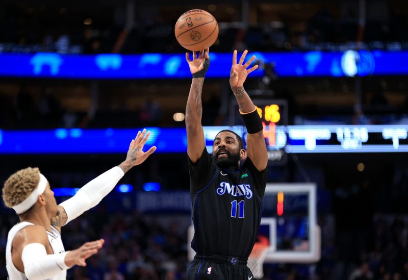 DALLAS, TX - FEBRUARY 14: Kyrie Irving #11 of the Dallas Mavericks shoots the ball against the San Antonio Spurs in the first half at American Airlines Center on February 14, 2024 in Dallas, Texas. NOTE TO USER: User expressly acknowledges and agrees that, by downloading and or using this photograph, User is consenting to the terms and conditions of the Getty Images License Agreement. (Photo by Ron Jenkins/Getty Images)