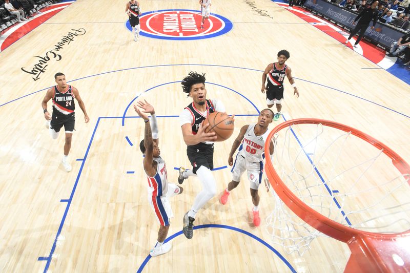 DETROIT, MI - JANUARY 06: Javante McCoy #17 of the Detroit Pistons shoots the ball during the game against the Detroit Pistons on January 06, 2025 at Little Caesars Arena in Detroit, Michigan. NOTE TO USER: User expressly acknowledges and agrees that, by downloading and/or using this photograph, User is consenting to the terms and conditions of the Getty Images License Agreement. Mandatory Copyright Notice: Copyright 2025 NBAE (Photo by Chris Schwegler/NBAE via Getty Images)