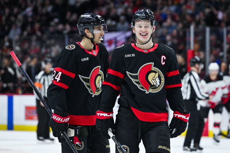 Jan 31, 2026; Ottawa, Ontario, CAN; Ottawa Senators left wing Brady Tkachuk (7) reacts after a discussion with center Dylan Cozens (24) against the New Jersey Devils during the first period at Canadian Tire Centre. Mandatory Credit: David Kirouac-Imagn Images
