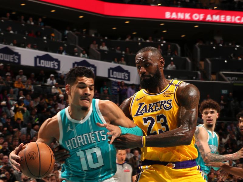 CHARLOTTE, NC - JANUARY 27:  LeBron James #23 of the Los Angeles Lakers plays defense during the game against the Charlotte Hornets on January 27, 2025 at Spectrum Center in Charlotte, North Carolina. NOTE TO USER: User expressly acknowledges and agrees that, by downloading and or using this photograph, User is consenting to the terms and conditions of the Getty Images License Agreement. Mandatory Copyright Notice: Copyright 2025 NBAE (Photo by Kent Smith/NBAE via Getty Images)