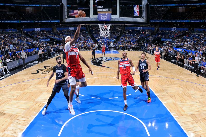 ORLANDO, FL - NOVMEBER 10: Bilal Coulibaly #0 of the Washington Wizards drives to the basket during the game against the Orlando Magic on November 10, 2024 at Kia Center in Orlando, Florida. NOTE TO USER: User expressly acknowledges and agrees that, by downloading and or using this photograph, User is consenting to the terms and conditions of the Getty Images License Agreement. Mandatory Copyright Notice: Copyright 2024 NBAE (Photo by Fernando Medina/NBAE via Getty Images)