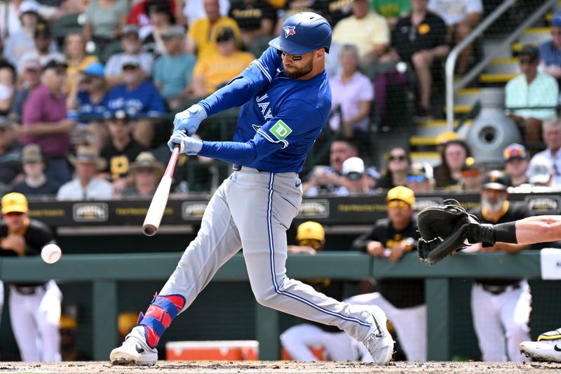 Mar 25, 2024; Bradenton, Florida, USA; Toronto Blue Jays center fielder Kevin Kiermaier (39) hits a triple in the second inning of the spring training game against the Pittsburgh Pirates at LECOM Park. Mandatory Credit: Jonathan Dyer-USA TODAY Sports