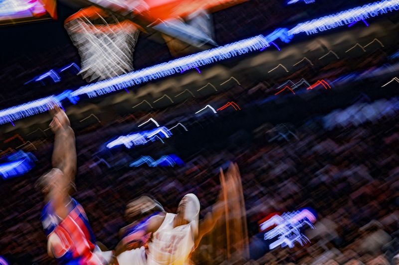 MIAMI, FLORIDA - OCTOBER 28: Jimmy Butler #22 of the Miami Heat shoots against the Detroit Pistons during the second half at Kaseya Center on October 28, 2024 in Miami, Florida. NOTE TO USER: User expressly acknowledges and agrees that, by downloading and or using this photograph, User is consenting to the terms and conditions of the Getty Images License Agreement. (Photo by Carmen Mandato/Getty Images)