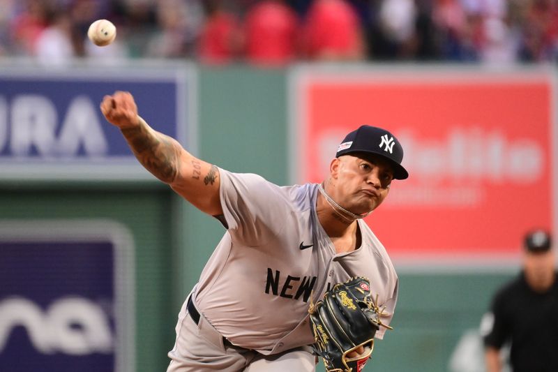 Jun 14, 2024; Boston, Massachusetts, USA; New York Yankees starting pitcher Luis Gil (81) pitches against the Boston Red Sox during the first inning at Fenway Park. Mandatory Credit: Eric Canha-USA TODAY Sports