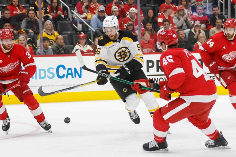 Nov 23, 2024; Detroit, Michigan, USA; Boston Bruins right wing Justin Brazeau (55) handles the puck during the third period of the game against the Detroit Red Wings at Little Caesars Arena. Mandatory Credit: Brian Bradshaw Sevald-Imagn Images